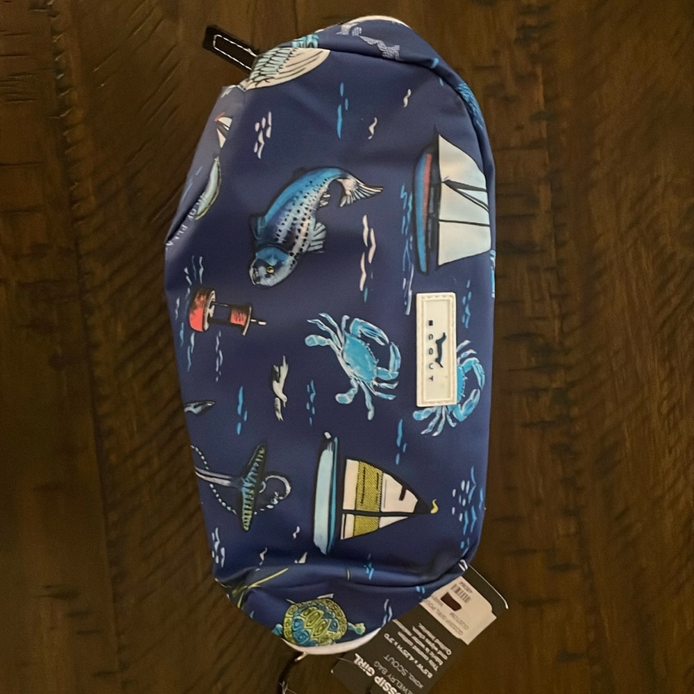 Celebrate your stuff with this new with tag Scout jewelry or make up bag.